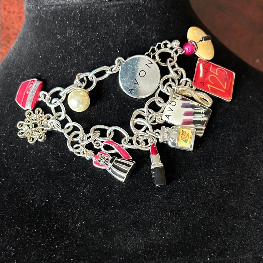 125 anniversary Avon Silver Charm Bracelet with Red and Gold Details